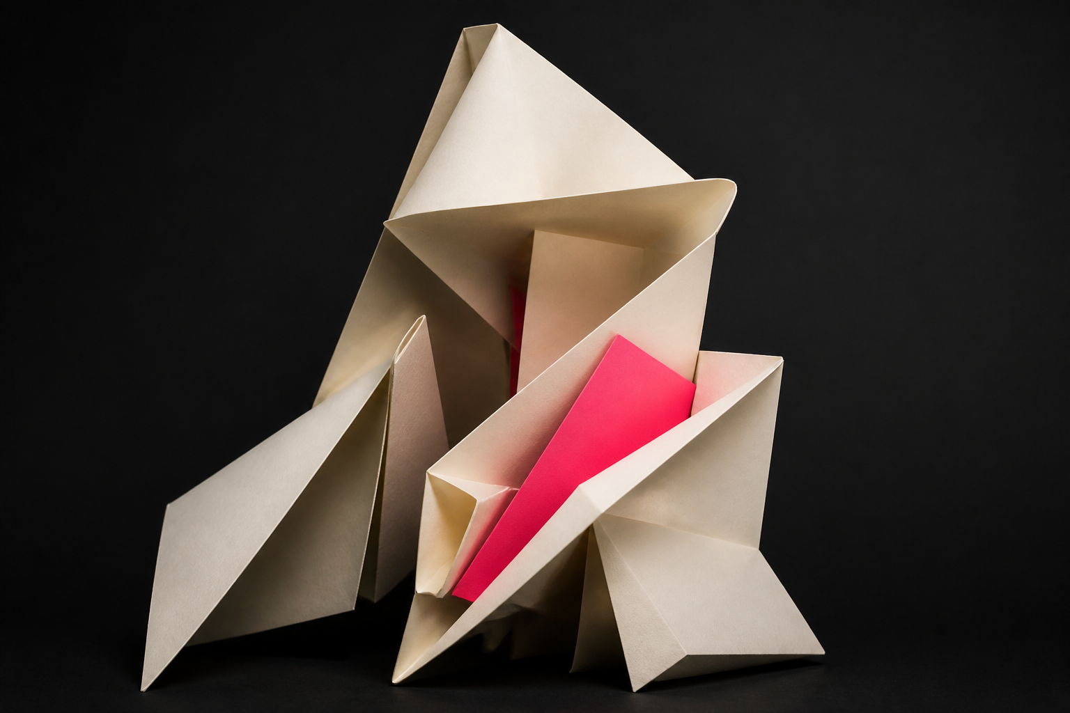 Folded cream paper architecture with a hot-pink sheet in the folds