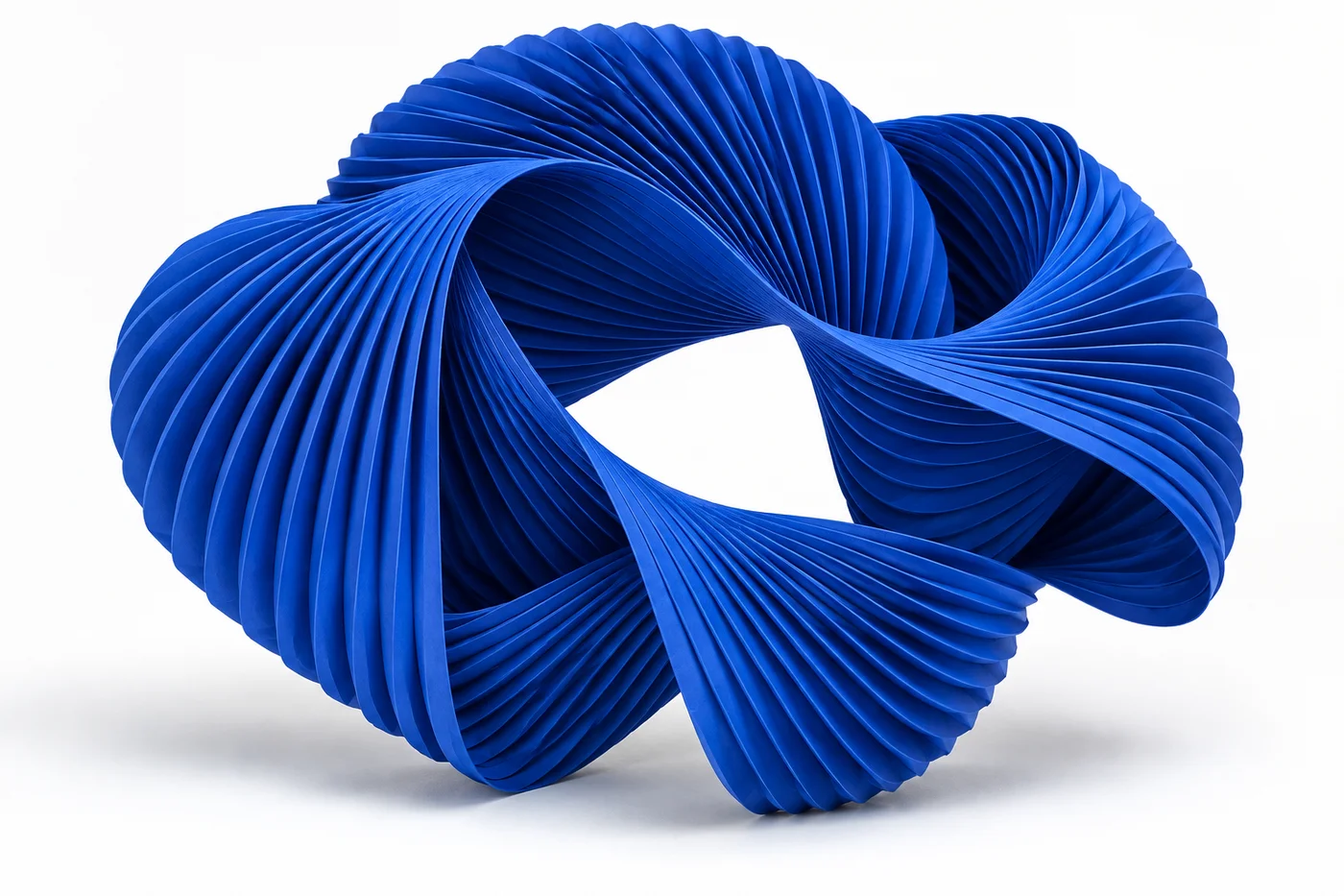 An intricate blue paper sculpture, folding many layers into a single connected form